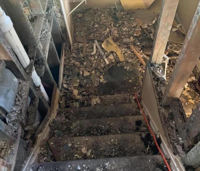 fire, mold, and water damaged stairway