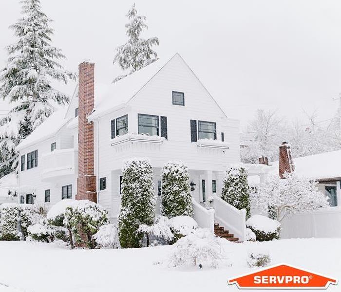 snow covering a house in winter