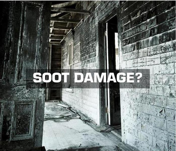 Text that reads "Soot damage" in white letters.